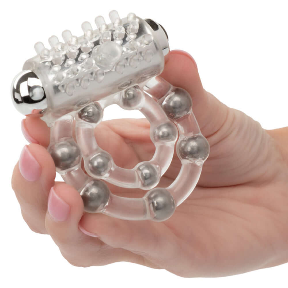 Maximus Enhancement Ring 10 Beads Rechargeable displayed in a hand, showcasing its design and features for mutual pleasure.