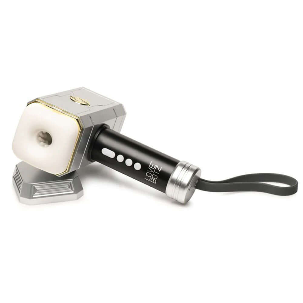 Thunder Stroker Sucking Masturbator Silver with sleek design and easy-grip handle for intense stimulation.