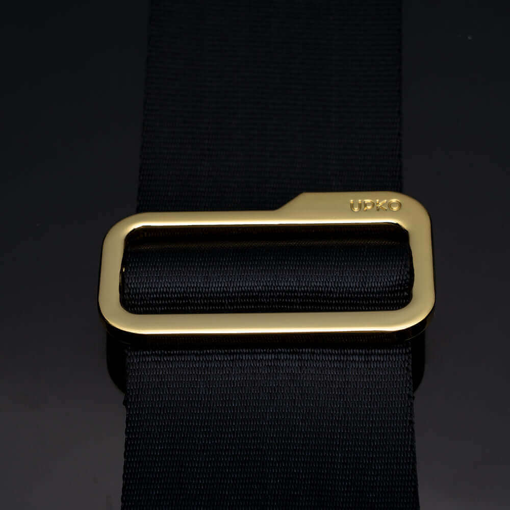 UPKO Adjustable Bed Restraint Strap featuring a sturdy gold buckle on high-quality black nylon for enhanced comfort and safety.