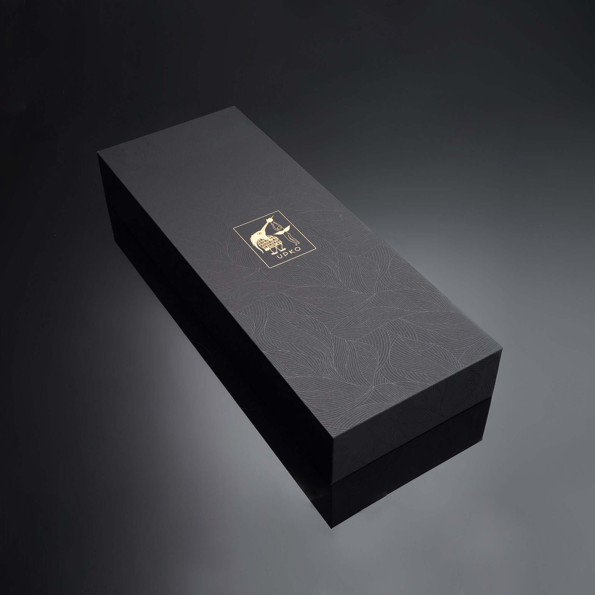 Luxury black gift box with gold logo, elegant design, perfect for special occasions and premium gifts.