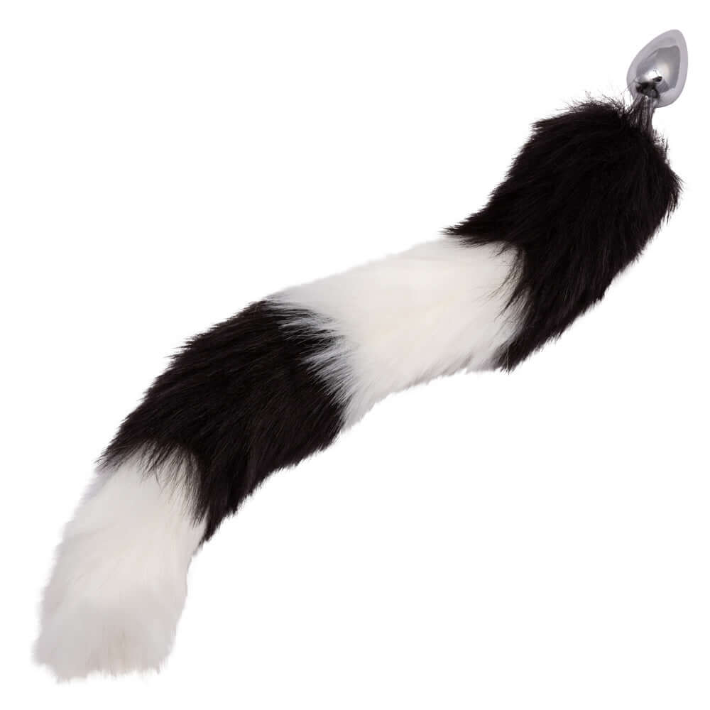Running Wild Tail Butt Plug Black White with sleek metal tip and luxurious black and white fur tail.
