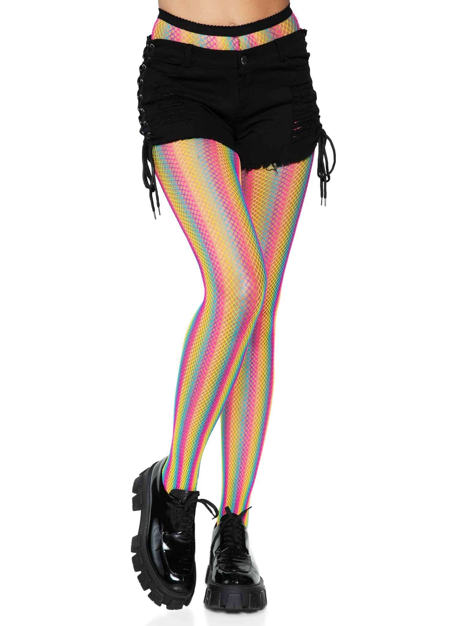 Model wearing Neon Rainbow Striped Fishnet Tights by Leg Avenue with black shorts, showcasing the vibrant multicolor design.