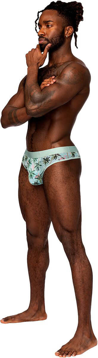Man wearing sheer print sheer thong underwear with flamingo design, large/x-large size, showcasing ultra-comfortable and breathable men's underwear.