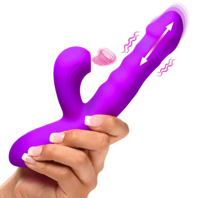 Bang Thrusting and Sucking Rabbit Vibrator Purple held in hand, showcasing its thrusting motion and clitoral suction features.