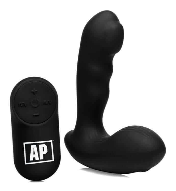 7x P-Milker Silicone Prostate Stimulator With Milking Bead next to its remote control for enhanced pleasure.
