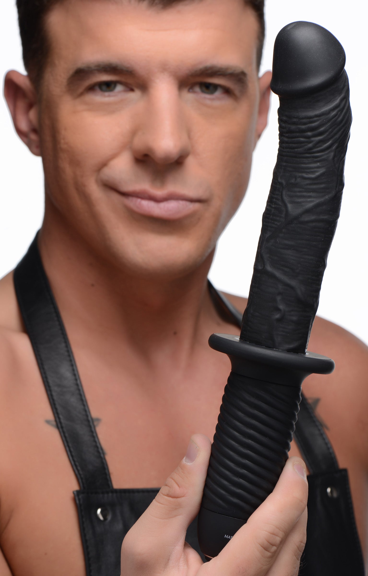 The Large Realistic 10X Silicone Vibrator with Handle held by a model, showcasing its realistic design and curved shaft.