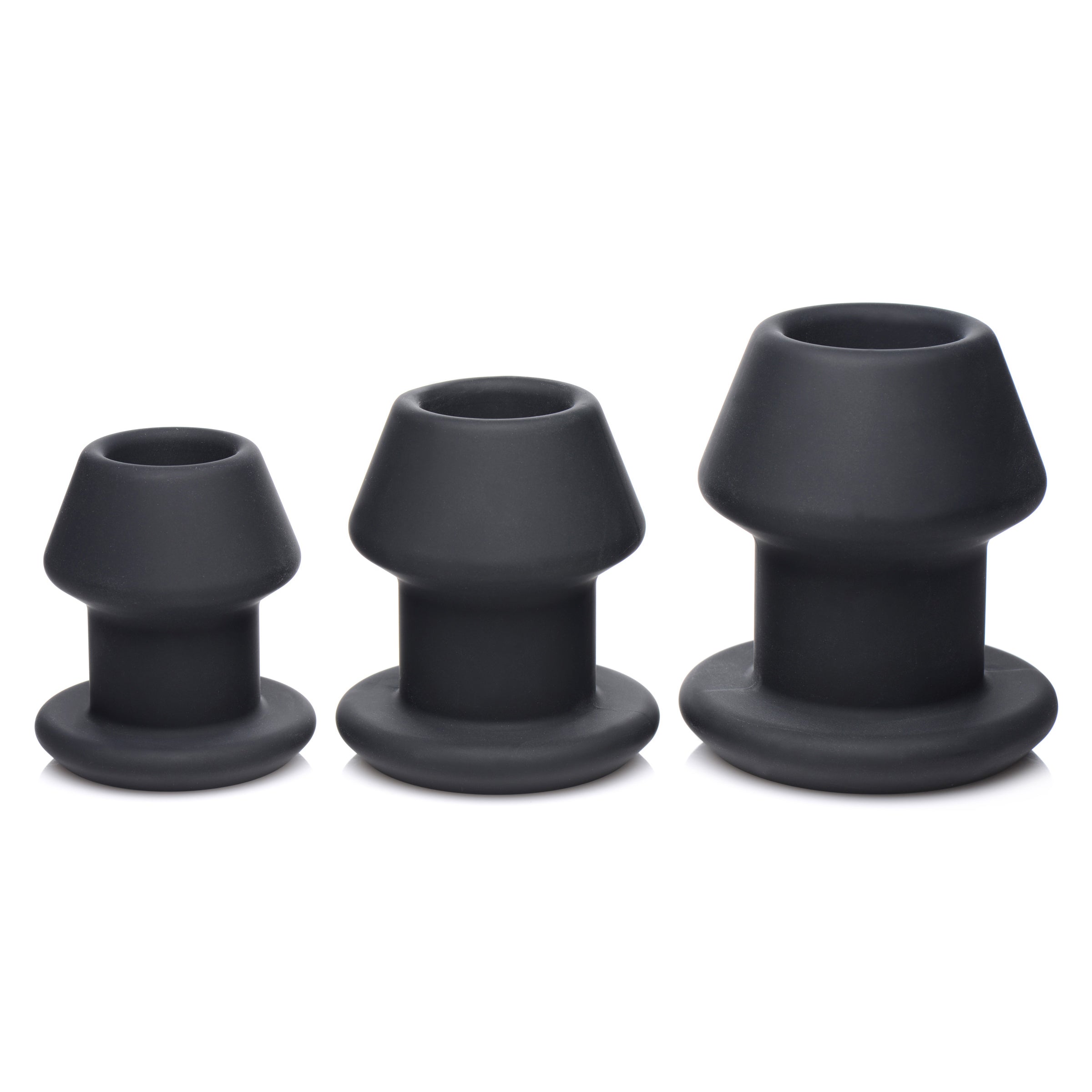 Gape-Grommets 3 Piece Hollow Silicone Anal Dilator Set featuring three progressively sized hollow dilators.