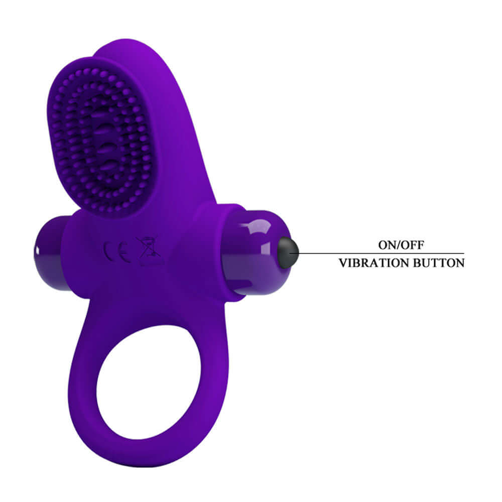 Pretty Love Vibrating Cock Ring II Purple close-up view showing vibration button and silicone texture.