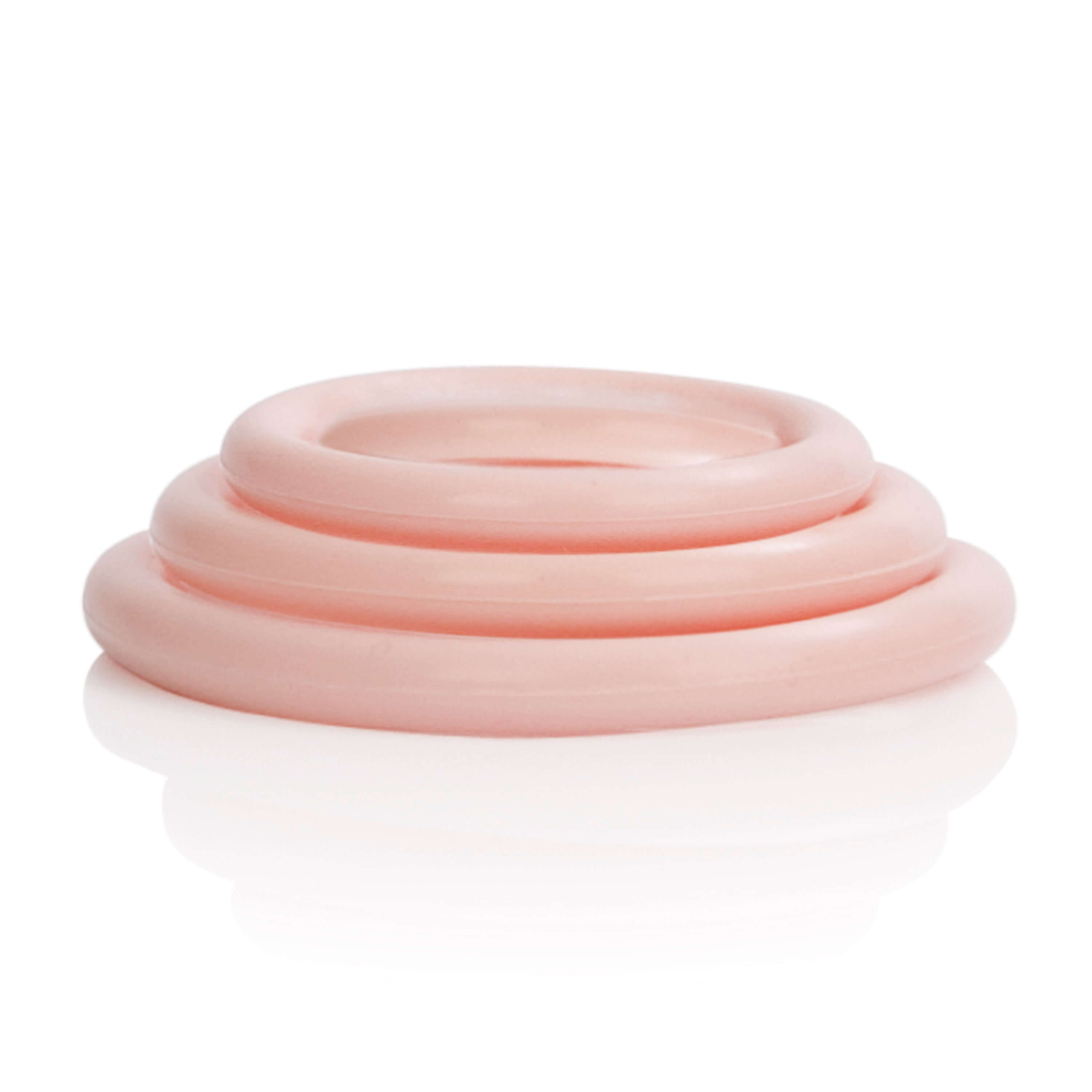 Silicone Support Rings 3 Pack Ivory in soft pink color stacked for display.