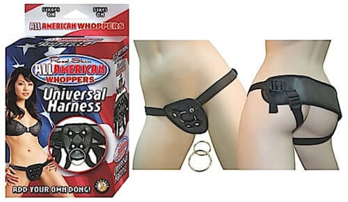 All American Whoppers Universal Strap On Harness Black in packaging, showing versatile strap-on design and fittings.