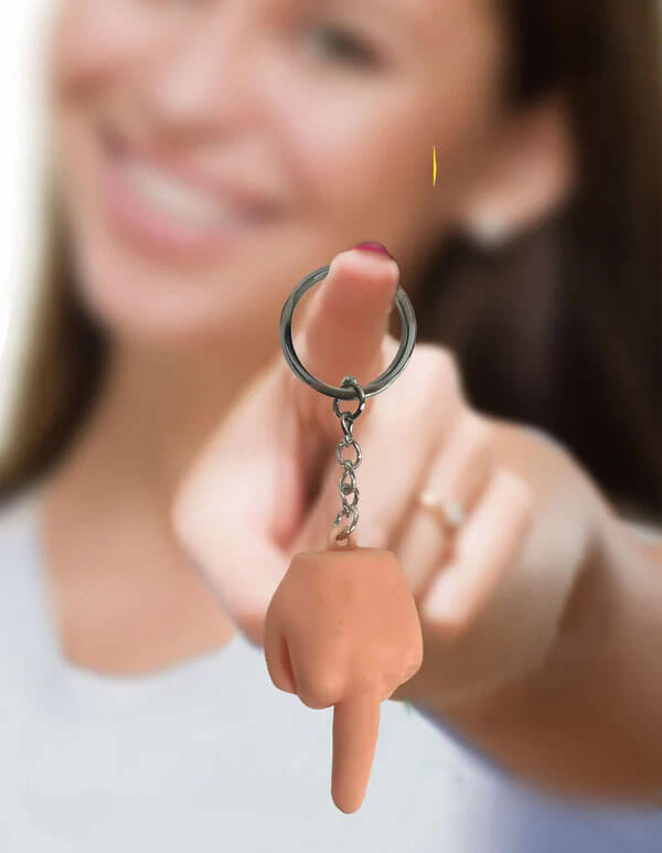 Super Fun Key Chain Squishy Fu Finger 6 Pack shown in use, highlighting its playful design and humorous appeal.