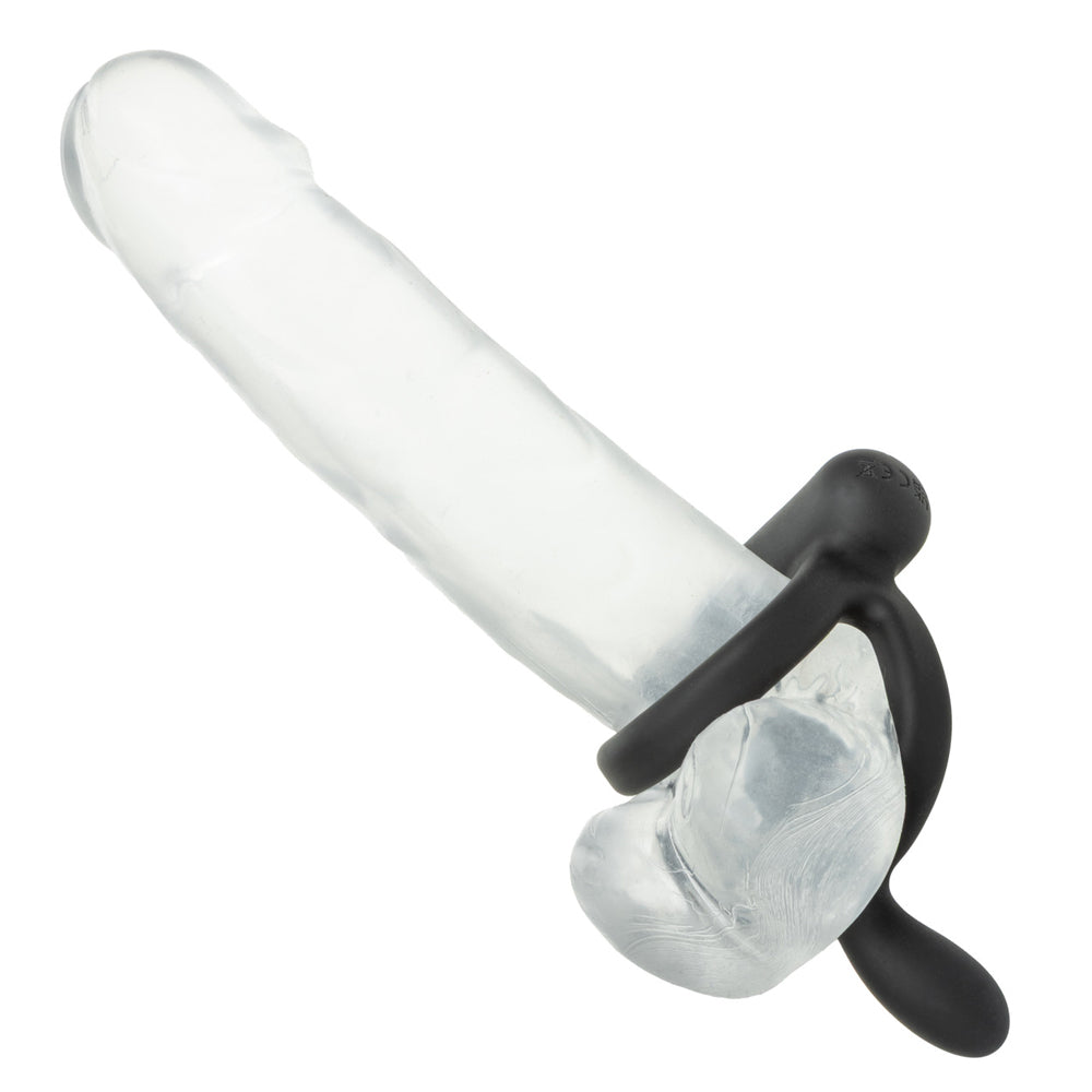 Closer Intimate Rechargeable Ring Caress Black positioned on a clear phallus, highlighting secure support and stimulation.