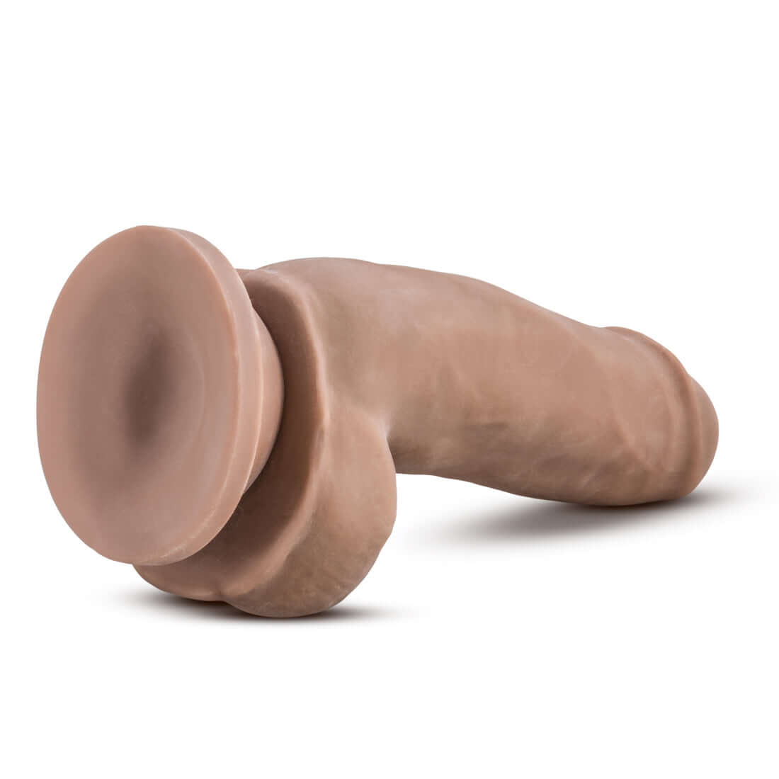 Au Naturel 7 Inch Sensa Feel El Gordo Dildo Latin shown from an angle, highlighting its realistic design and texture.