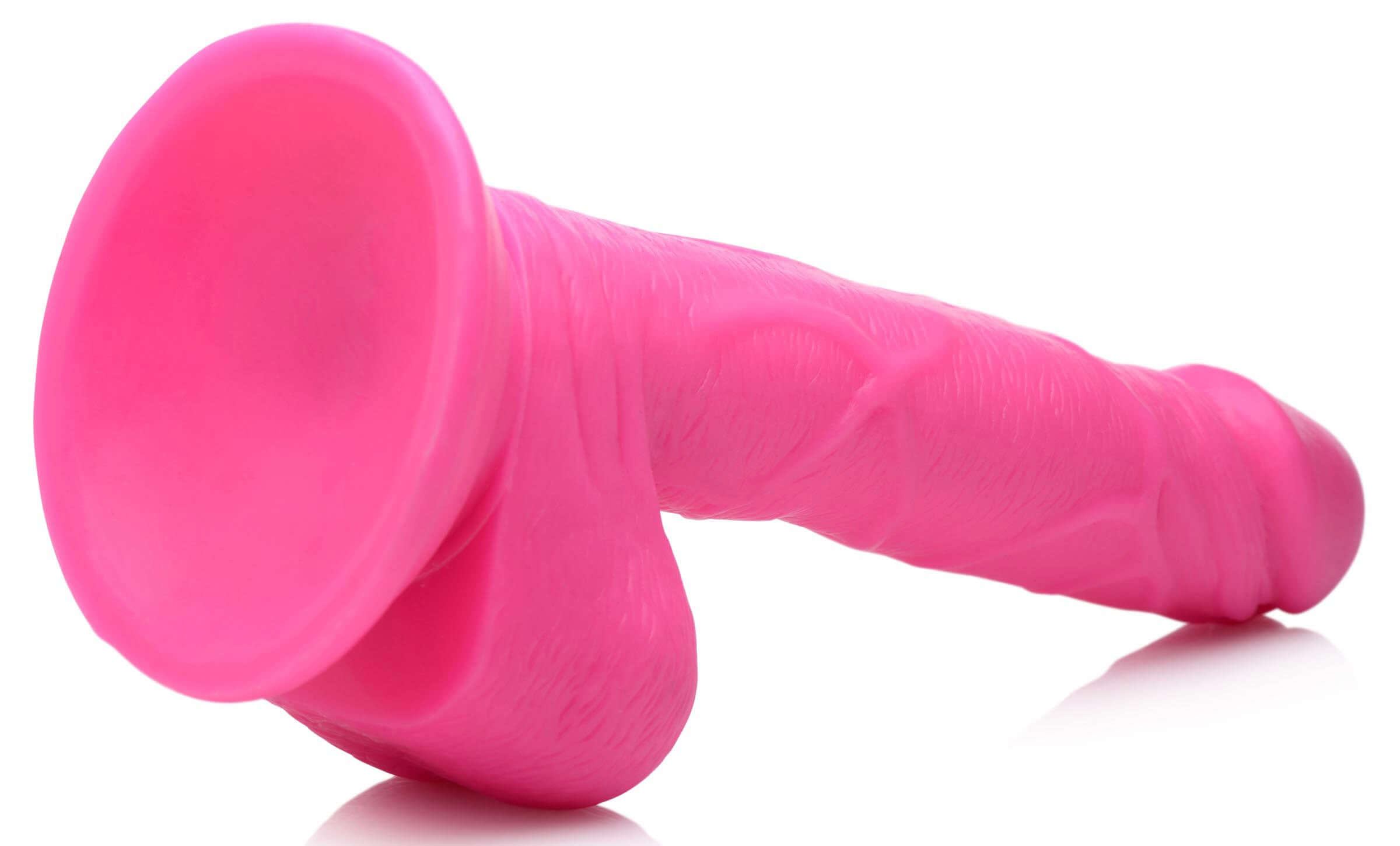 Pop Pecker 6.5 Inch Dildo With Balls Pink featuring a realistic design and lifelike texture for added pleasure.