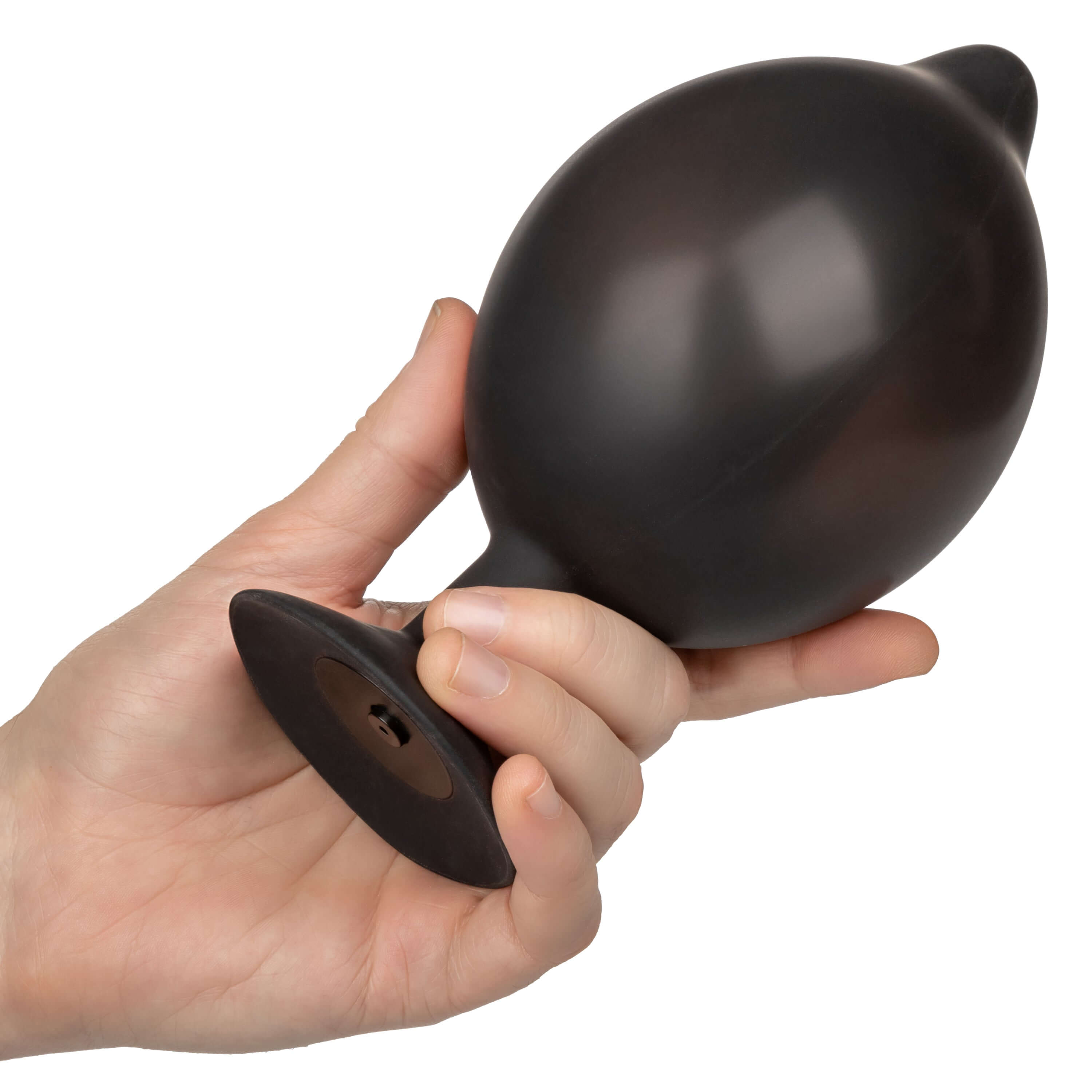 Hand holding an XL Silicone Inflatable Plug Black, showcasing its design and premium quality.