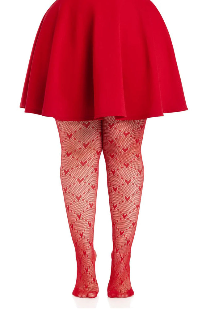 Leg Avenue Plus Size Valentina Heart Net Tights 1X 2X Red worn under a red skirt, showcasing the heart-patterned design.