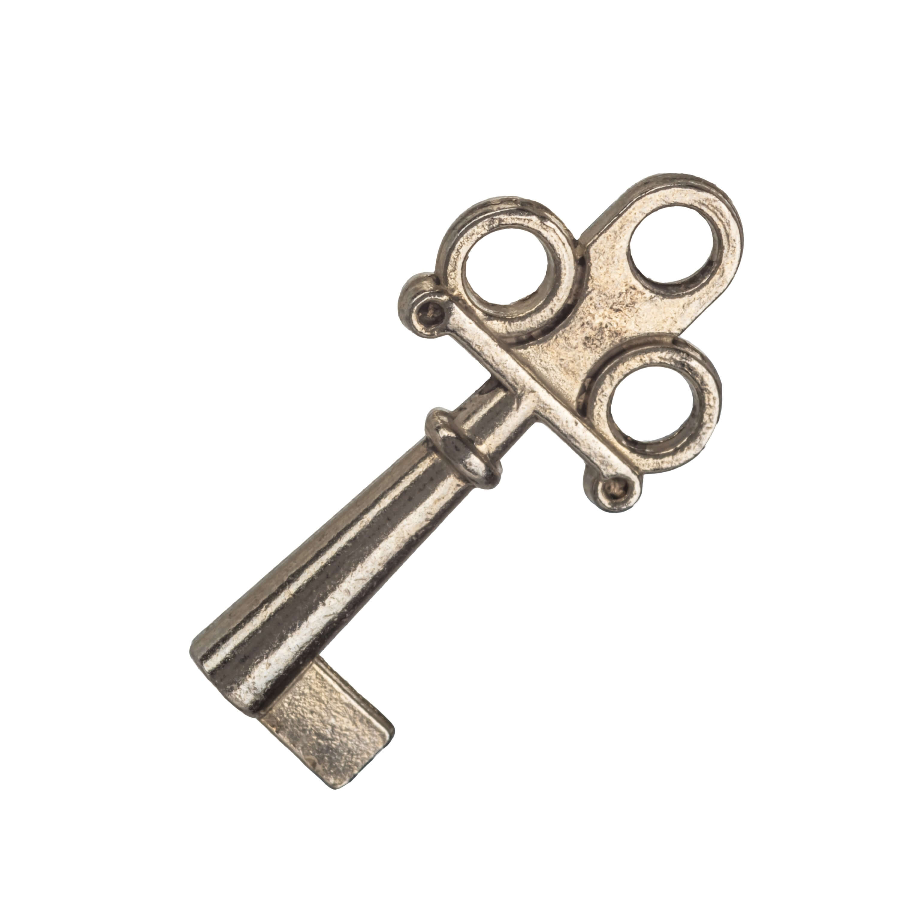 Antique silver key with circular handle and a simple design, perfect for decorative or themed purposes.