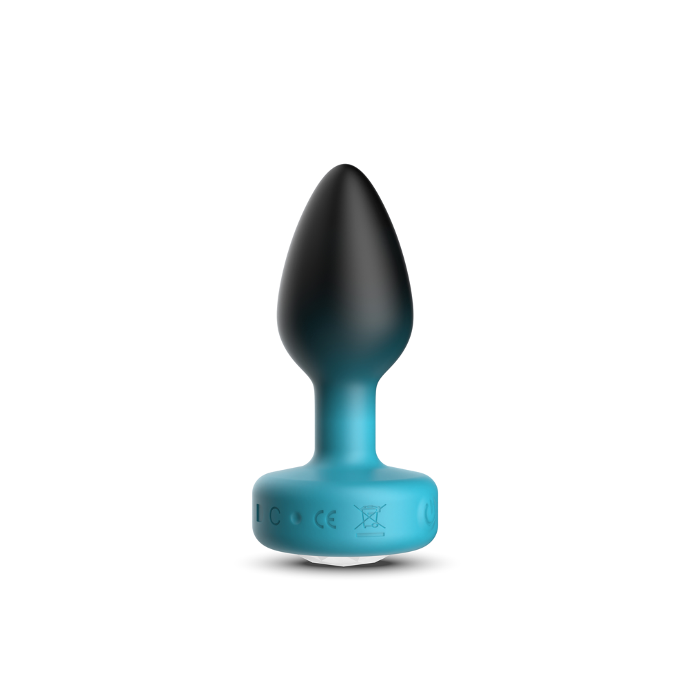 Cheeky Charms Eluxe Vibrating Anal Plug Medium in blue and black, featuring elegant design and textured surface.