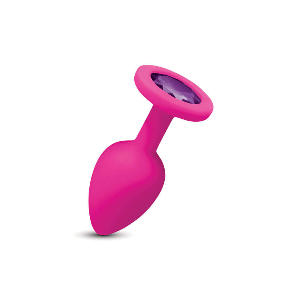 Gemma Purple Gem Pink Silicone Plug Small, a vibrant teardrop-shaped anal plug with a purple gem design.