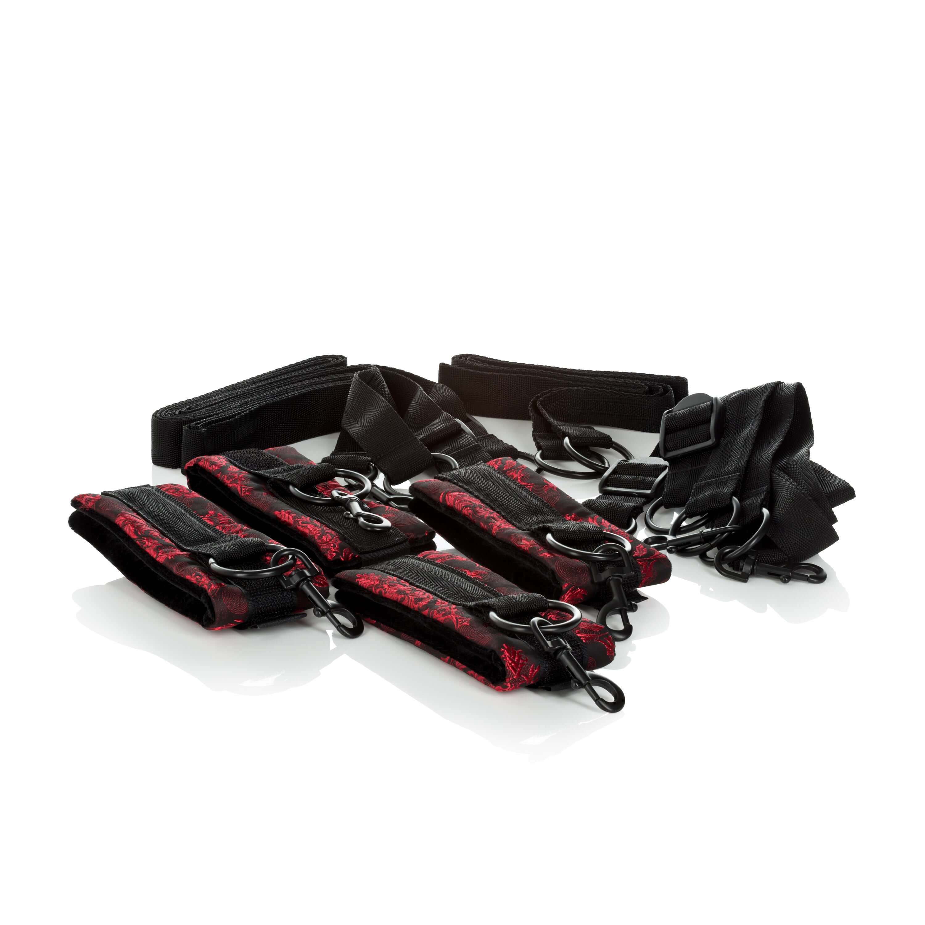 Scandal Bed Restraints featuring stylish straps and adjustable hooks for enhanced immobilization and sensation.