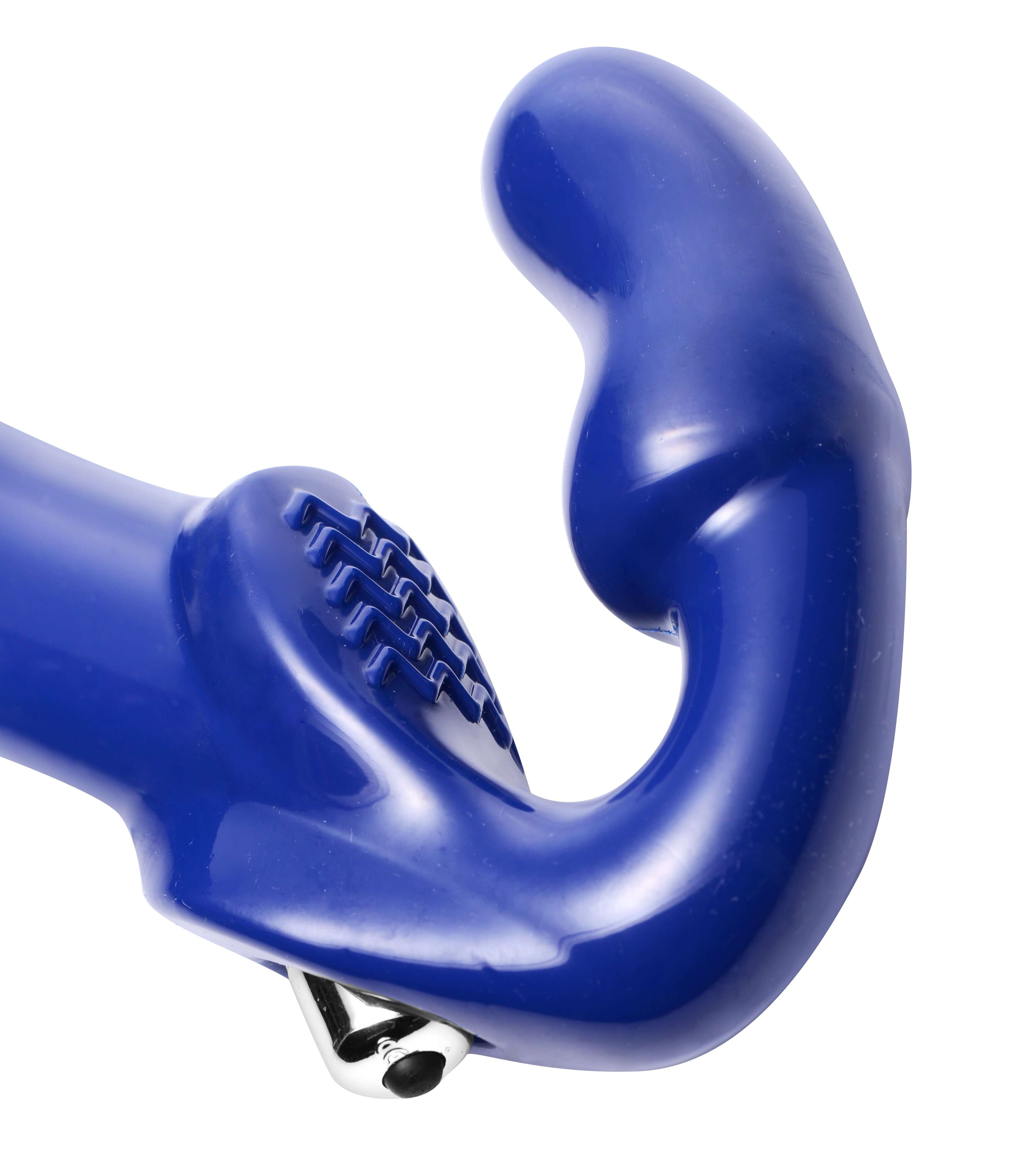 Revolver II Vibrating Strapless Strap on Dildo Blue close-up showing smooth curves and insertable design.