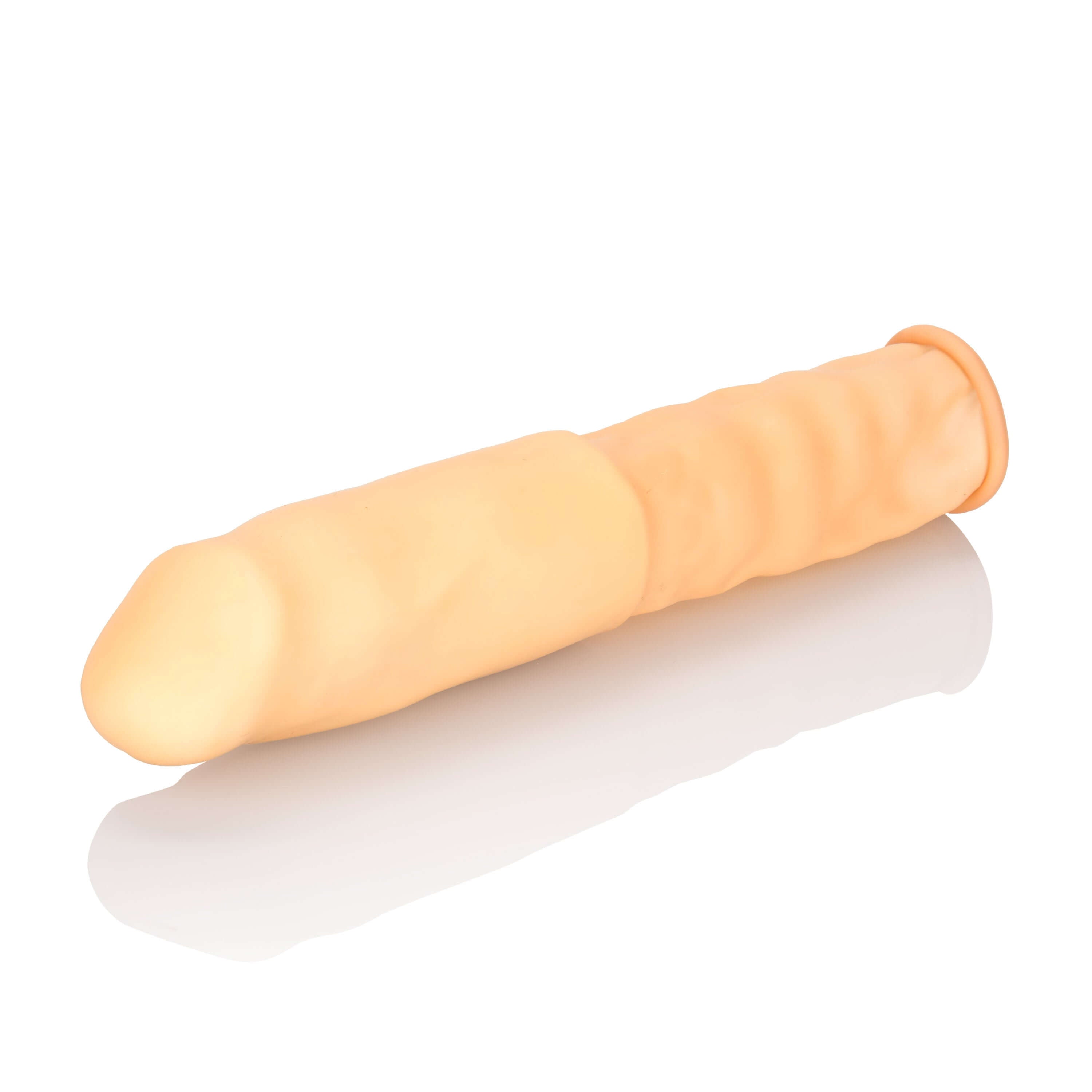 4 Inch Latex Penis Extension Ivory on a reflective surface, showcasing its realistic design and texture.