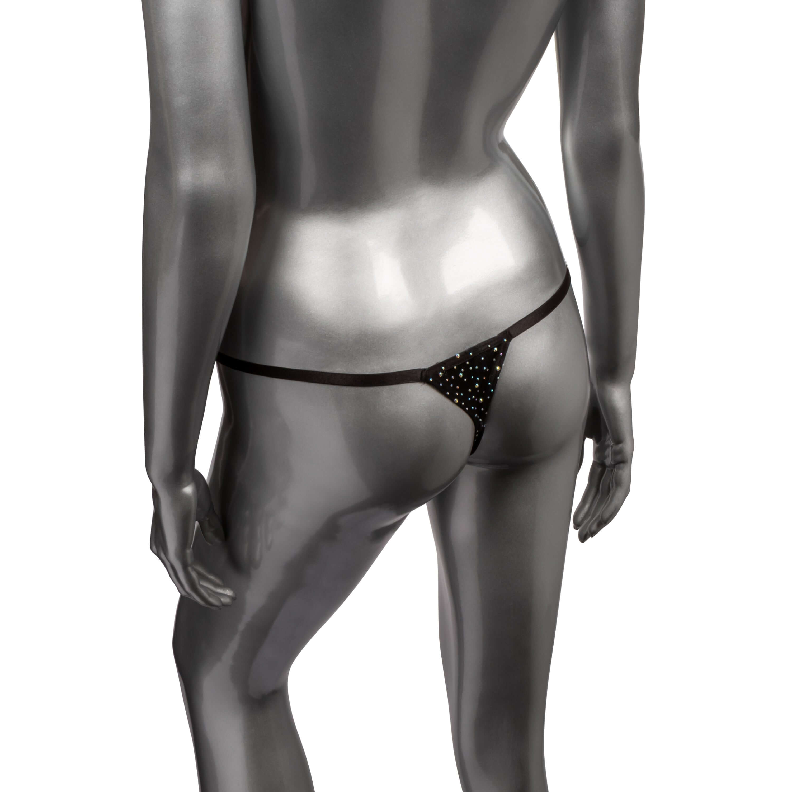 Radiance Plus Size Crotchless Thong Black displayed on a silver mannequin, emphasizing its seductive design.