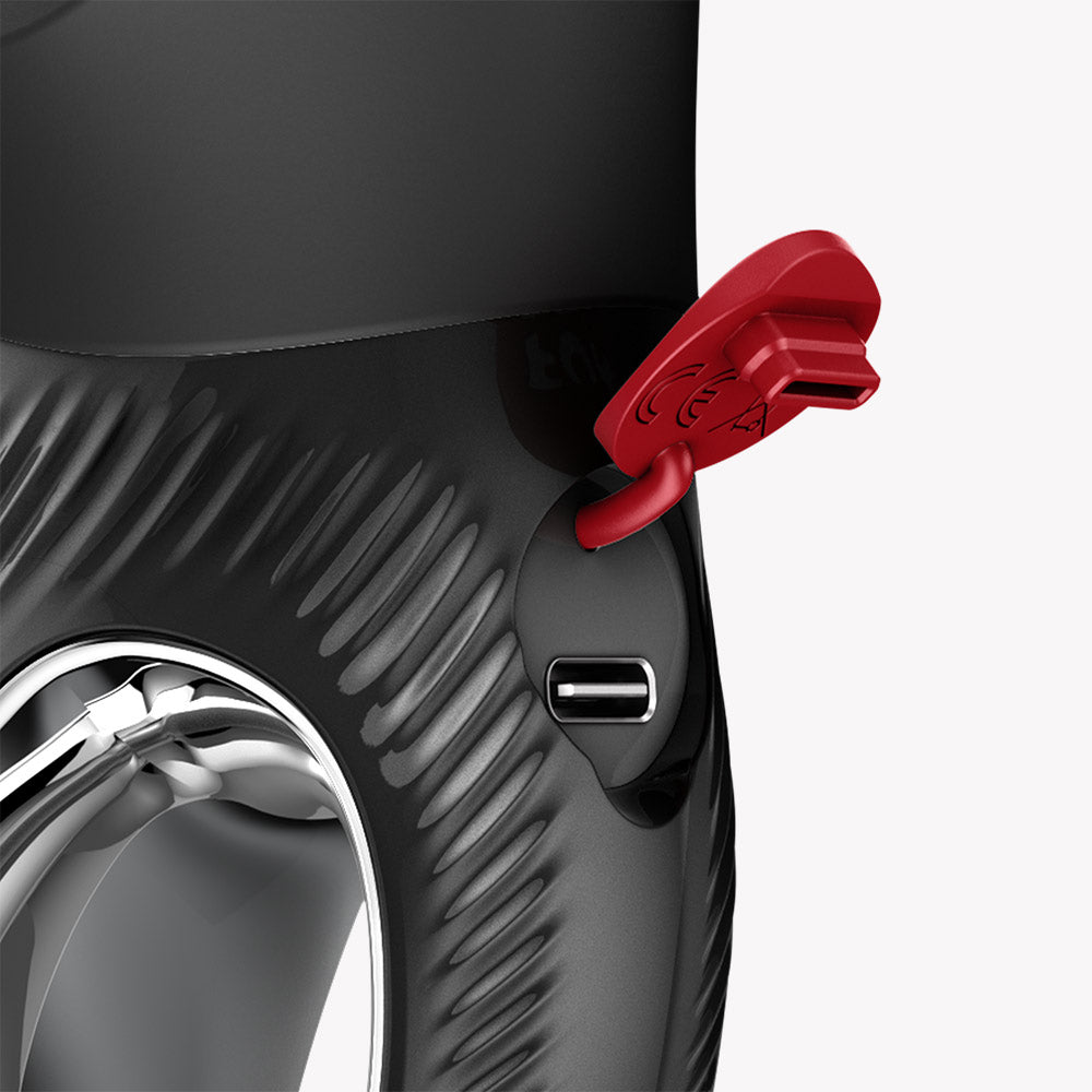 Close-up of the Fun Factory Miss Bi Rabbit Vibrator Black showing the charging port and ergonomic design.