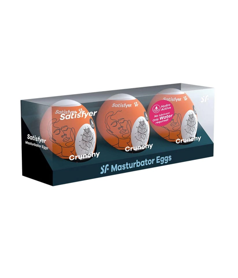 Satisfyer Crunchy Masturbator Egg 3 Pack Orange in a transparent box showcasing three discreet masturbation eggs.