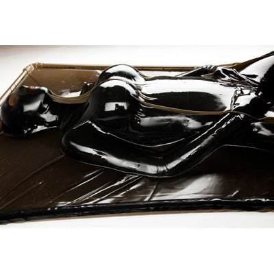 Kink Industries Extreme Black Latex Vacuum Bed offering intense body confinement with tight latex enclosure.