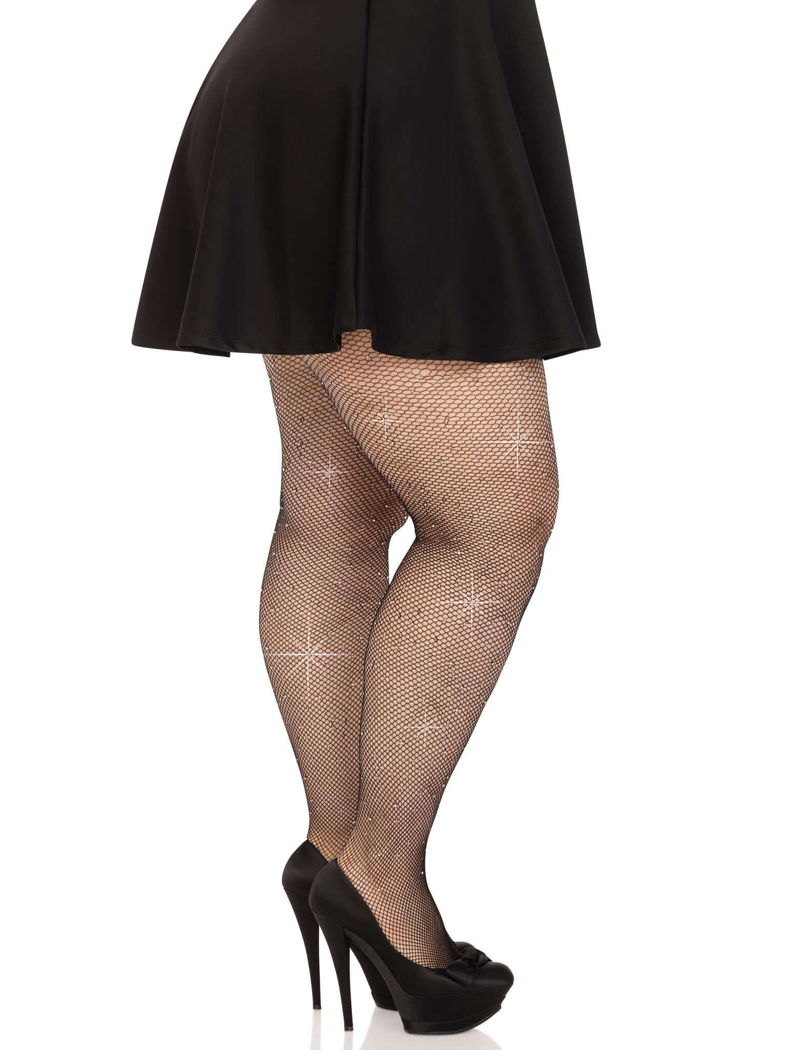 Plus-size model wearing Colby Rhinestone Fishnet Tights in black with sparkling rhinestones by Leg Avenue