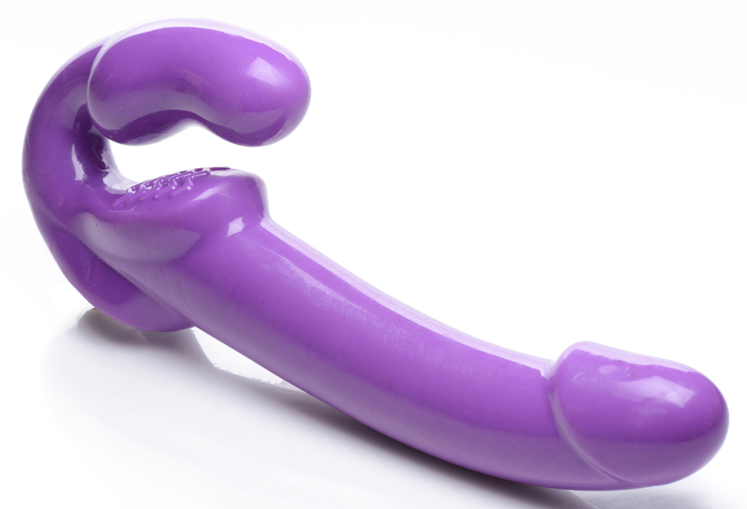 Strap U 7X Revolver Thick Vibrating Strapless Strap-On Dildo Purple displayed from the side on a white background.