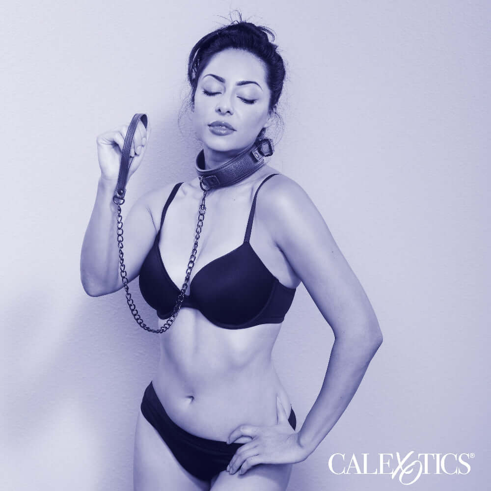 Woman wearing Nocturnal Collection Collar and Leash in black lingerie, showcasing elegance and control in intimate moments.