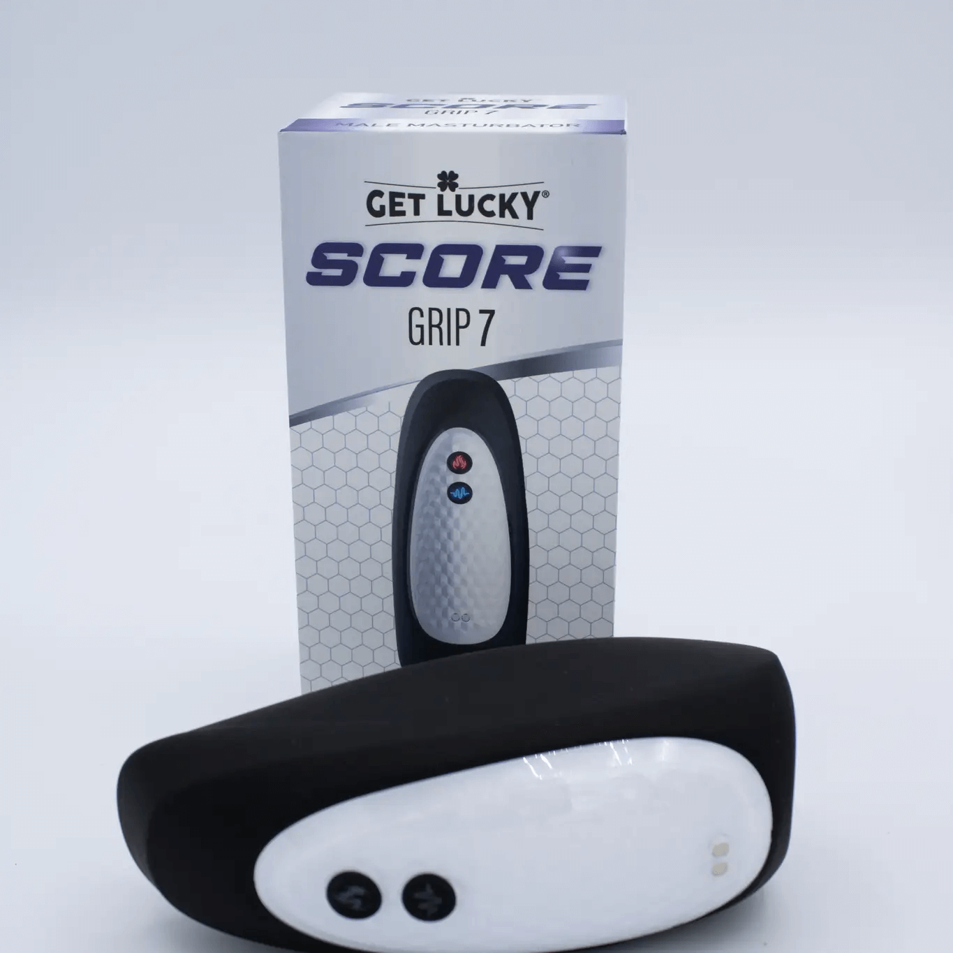 Score Grip 7 Vibrating Masturbator packaging and device displayed on a neutral background.