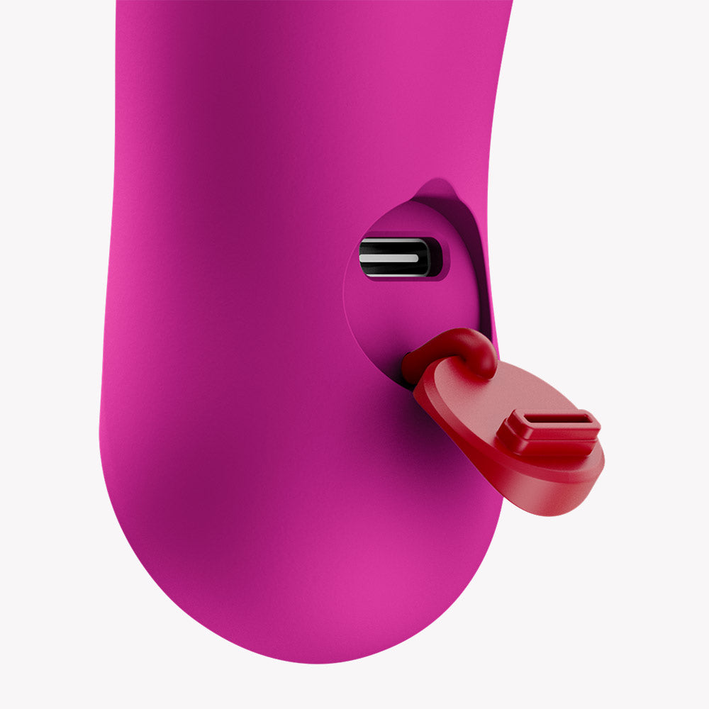 Fun Factory Bijou Bullet Vibrator Magenta charging port view with protective cap.