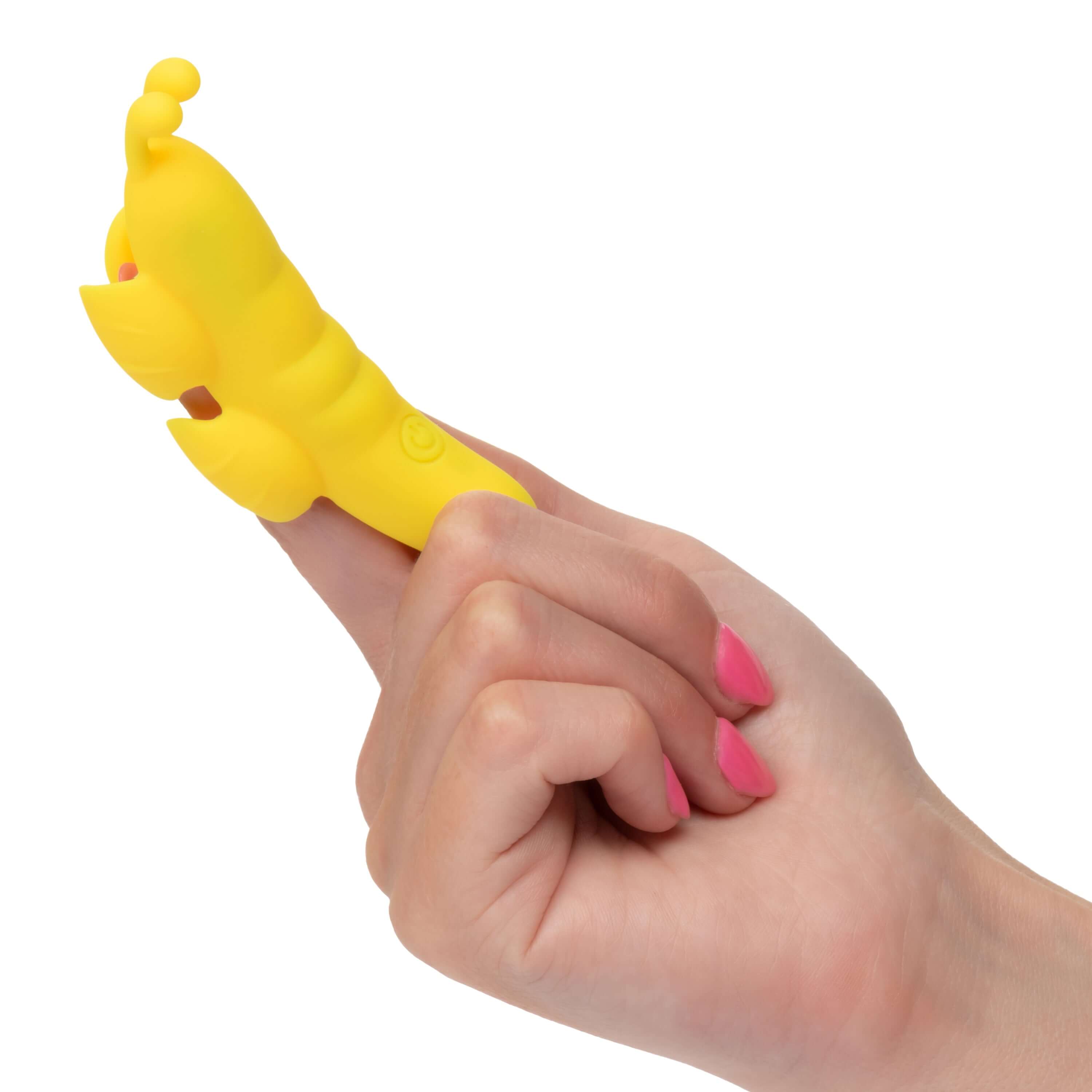 Hand holding the Neon Vibes the Butterfly Vibe Yellow, a compact finger teaser for precise stimulation.