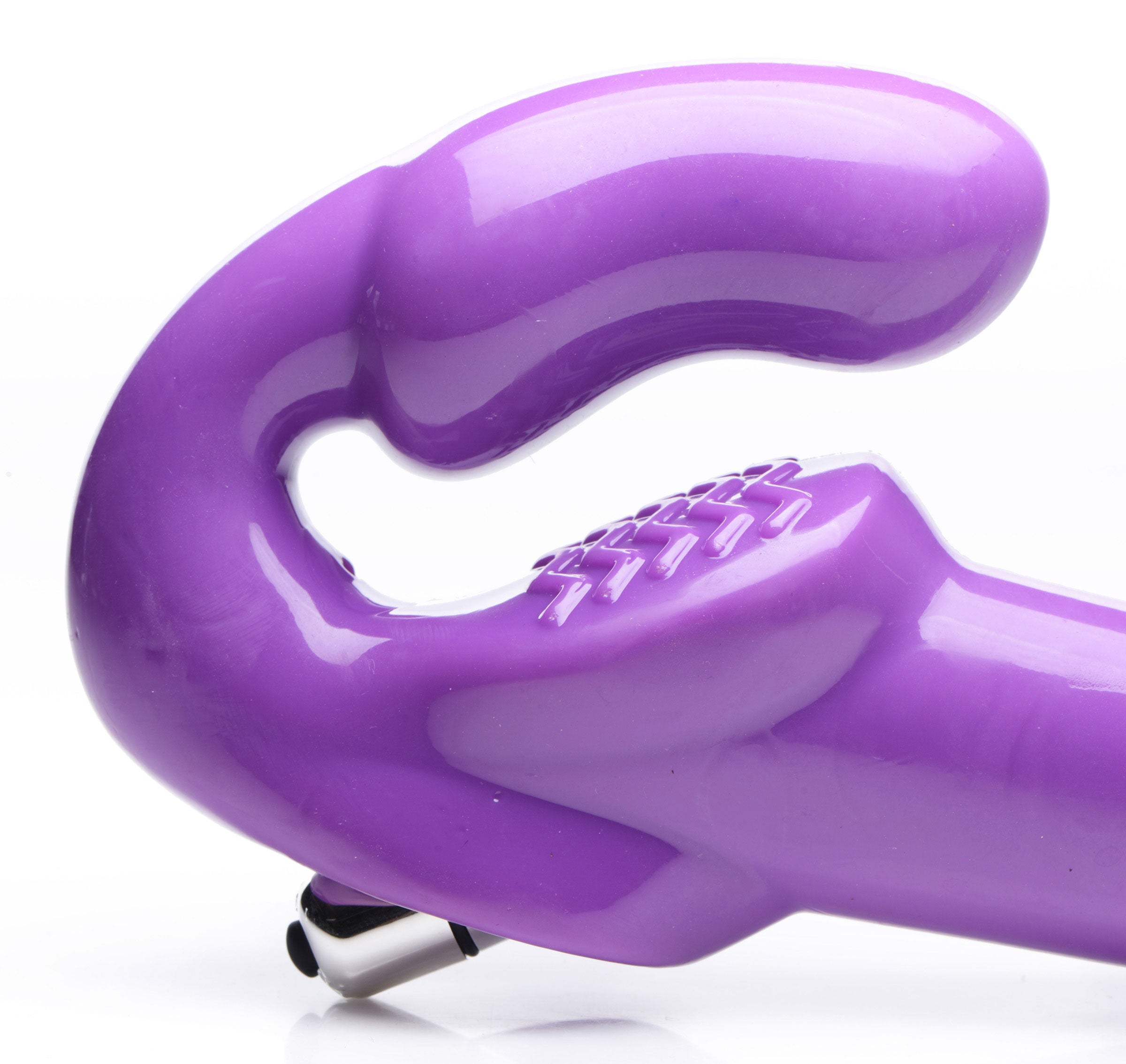 Strap U 7X Revolver Thick Vibrating Strapless Strap-On Dildo Purple close-up view showing its ergonomic design and texture.