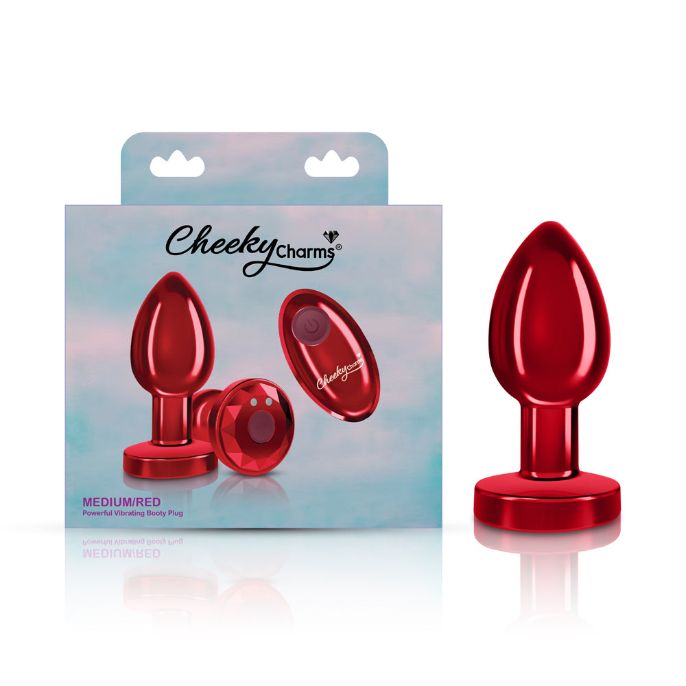 Vibrating Red Metal Remote Plug Medium in packaging with a sleek design and control for added pleasure.