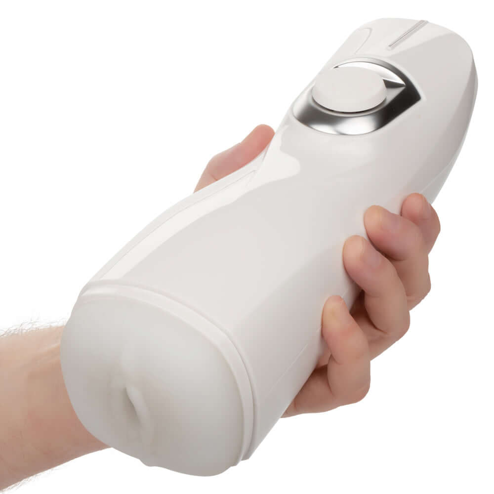 Hand holding the Optimum Power Lifelike Pulsar Stroker - White, a rechargeable and advanced personal pleasure device.