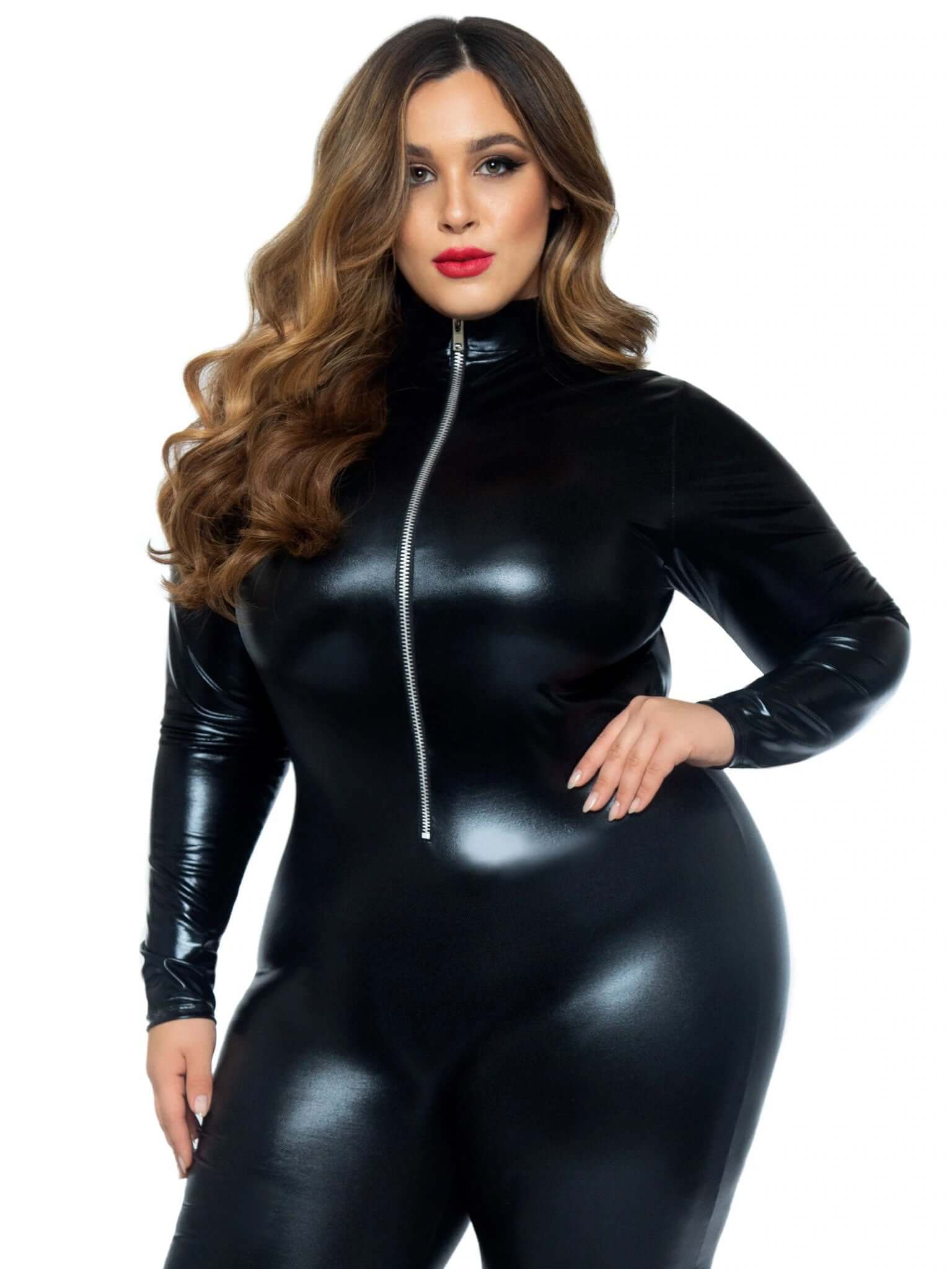 Plus size model in black lamé zipper front catsuit, showcasing sleek faux leather and curve-hugging fit for a bold, femme fatale look.