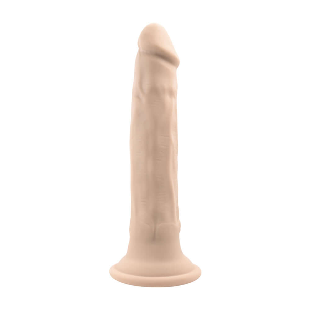 Light vibrating thruster with realistic vein textures and a crown-ridged tapered tip, featuring a powerful suction cup base.
