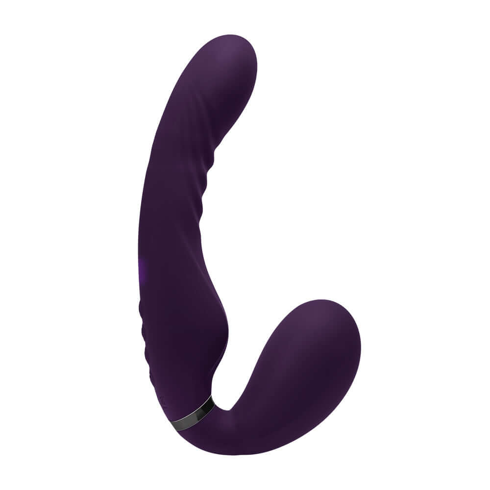 Purple inflatable massager with curved, textured shaft for versatile sensations and strap-on effect.