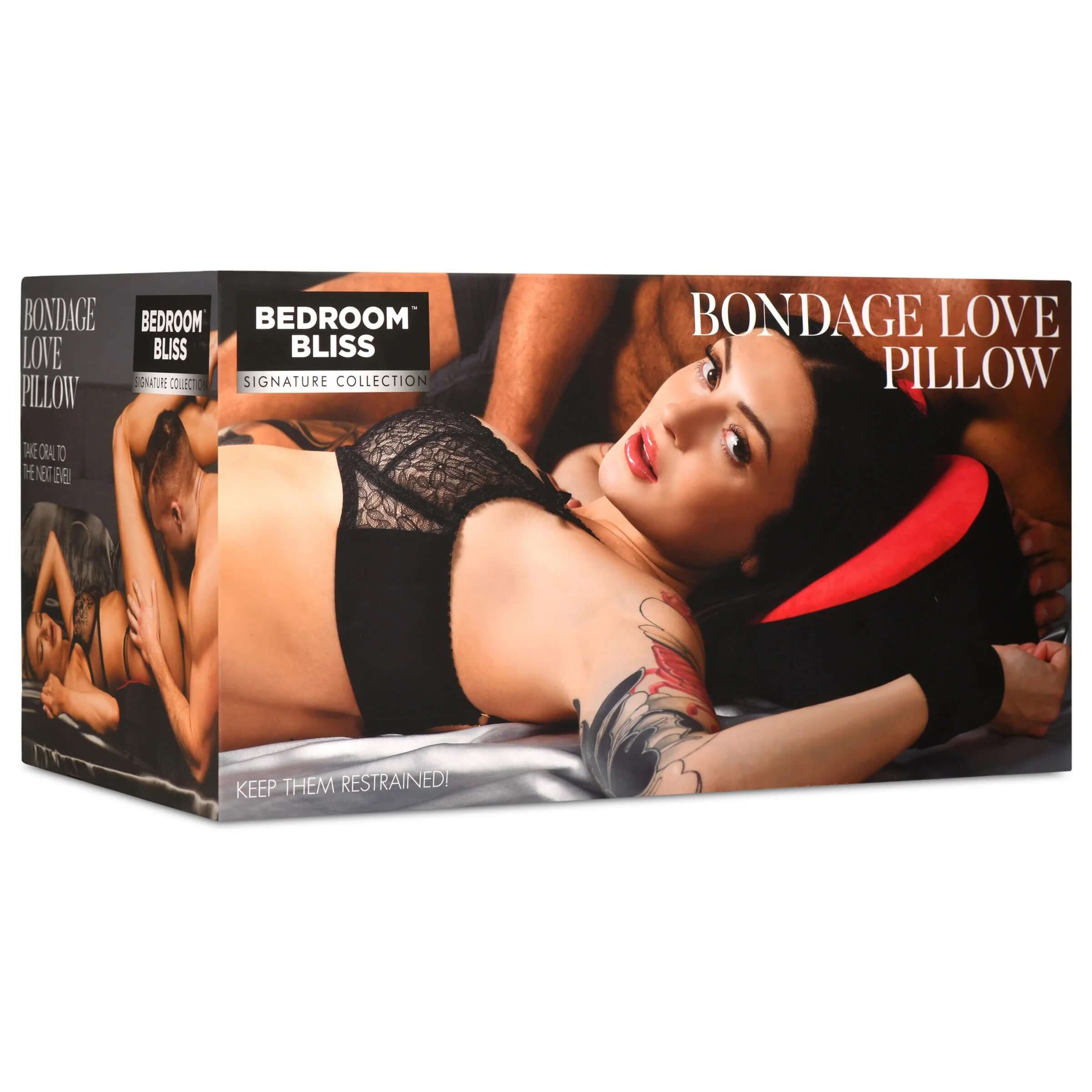 Bondage Love Pillow - Black/red heart-shaped pillow shown in packaging, designed for intimate play with high density foam and velvety cover.