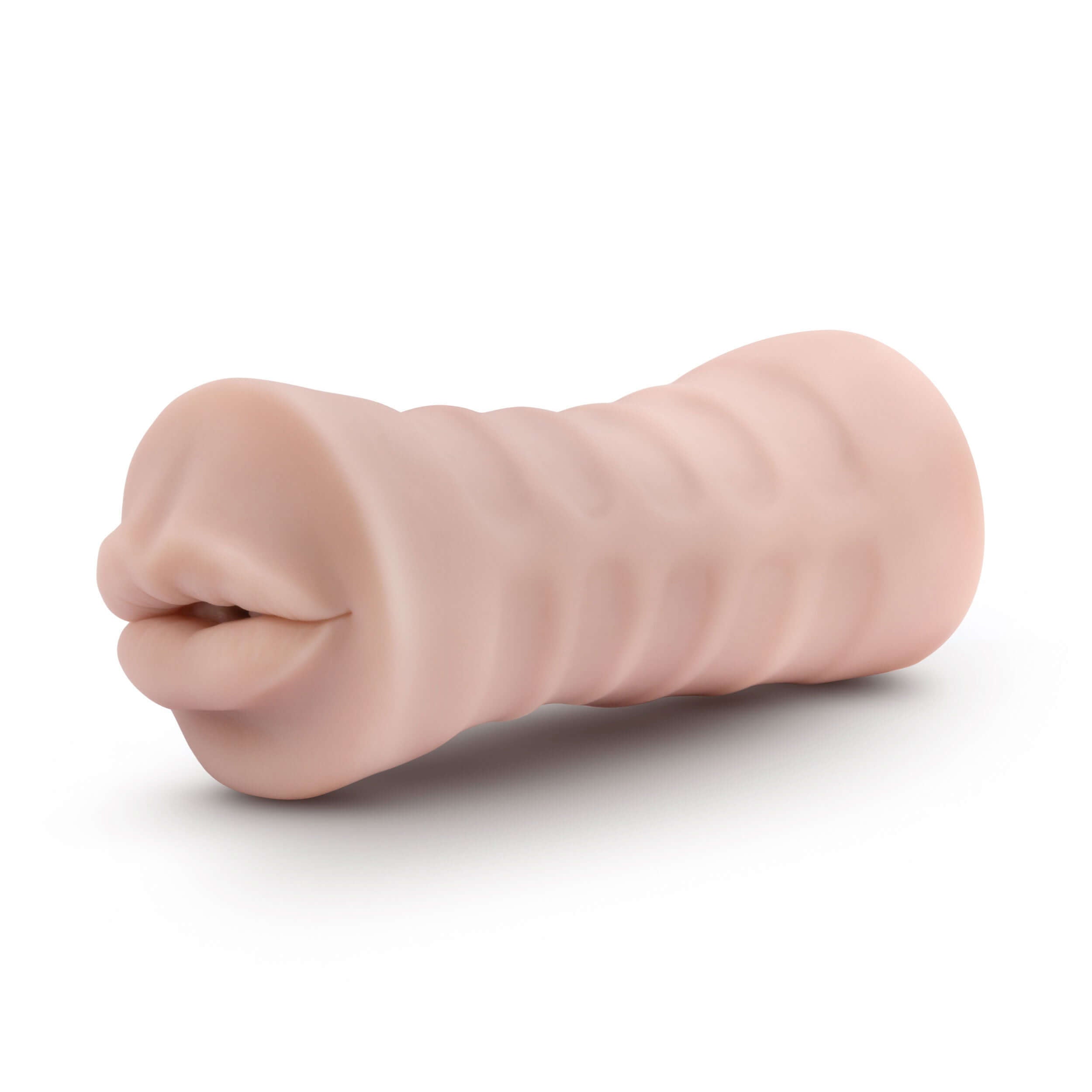 Beige vibrating stroker featuring a nubbed interior for enhanced pleasure and a realistic feel.