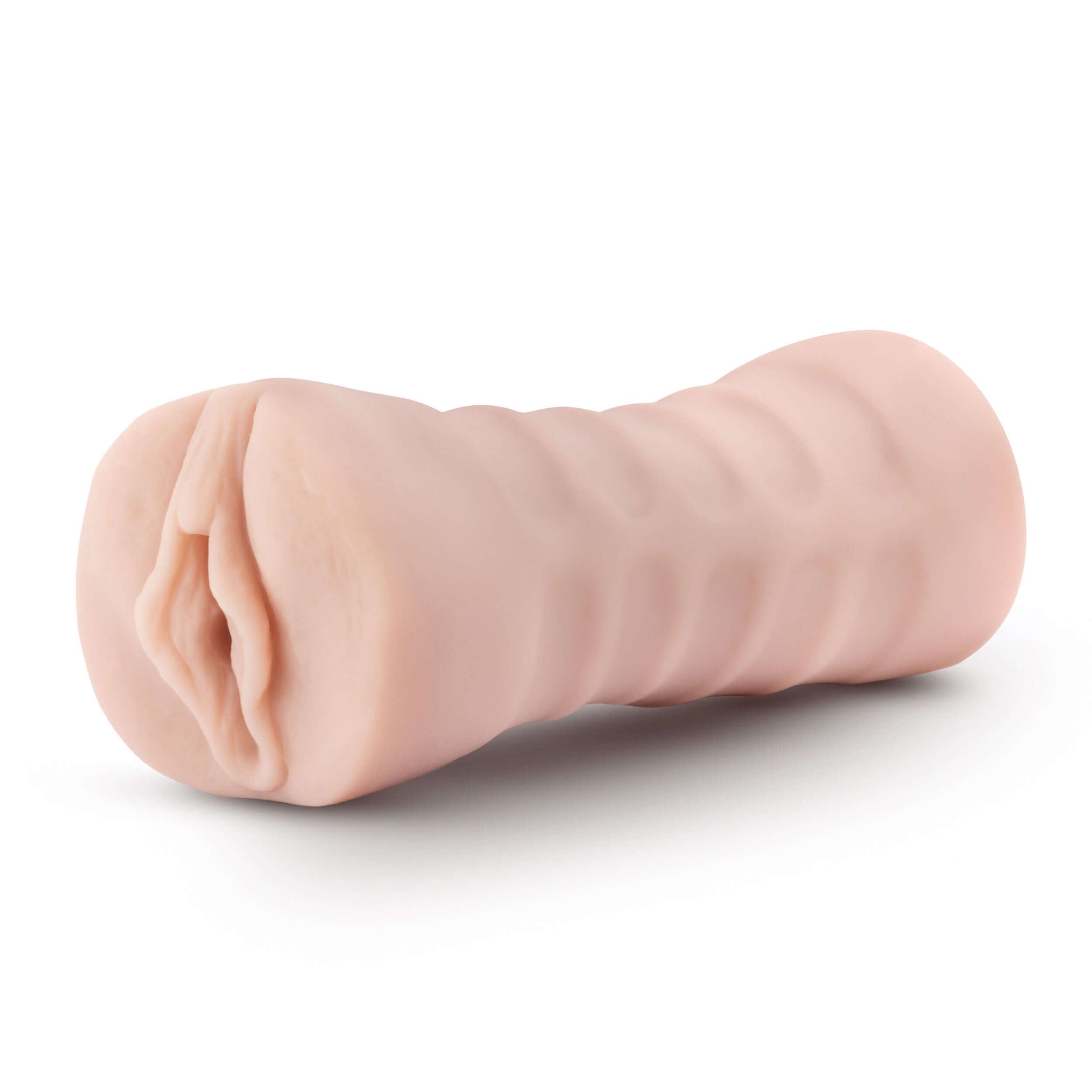 Enlust Destini vibrating stroker in beige, designed for superior pleasure with a soft, nubbed interior and open-ended design.